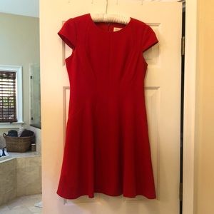 Red dress lined with pockets.